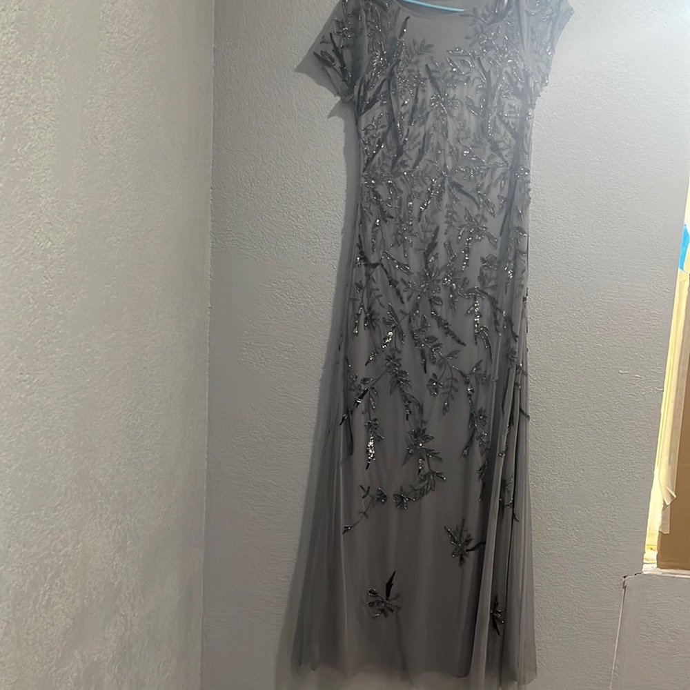 Beautiful evening gown silver color size 8